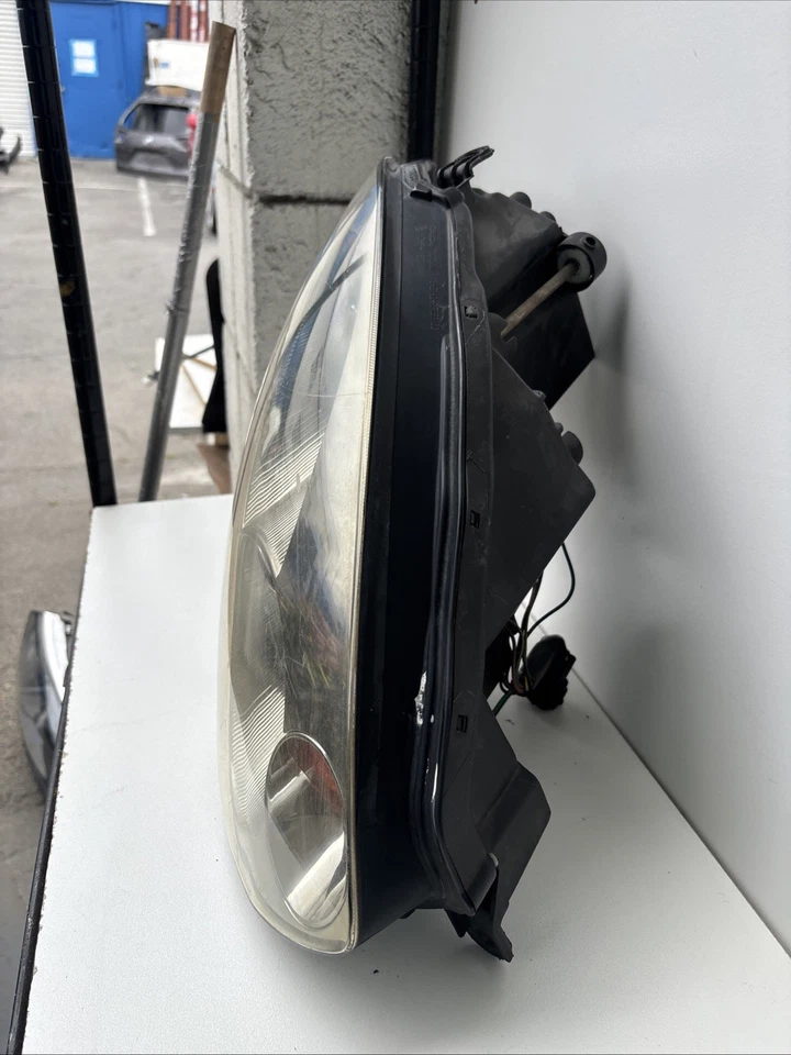 Faro izquierdo izquierdo Infiniti G35 2003-2005 usado OEM Foto 3 de 4