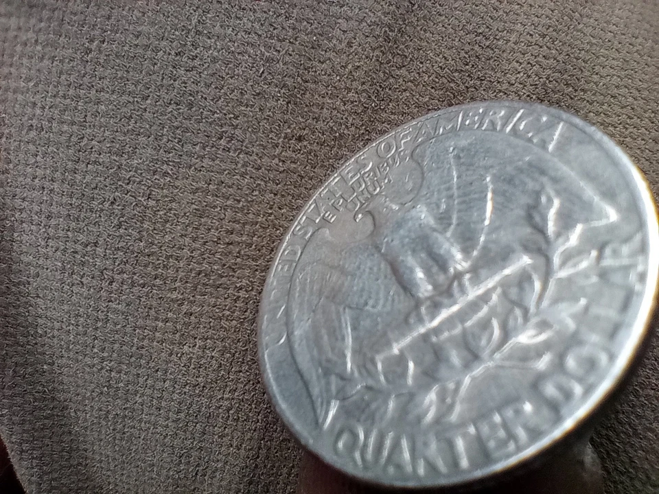 Cuarto de error 1965 sin marca de ceca Foto 4 de 4