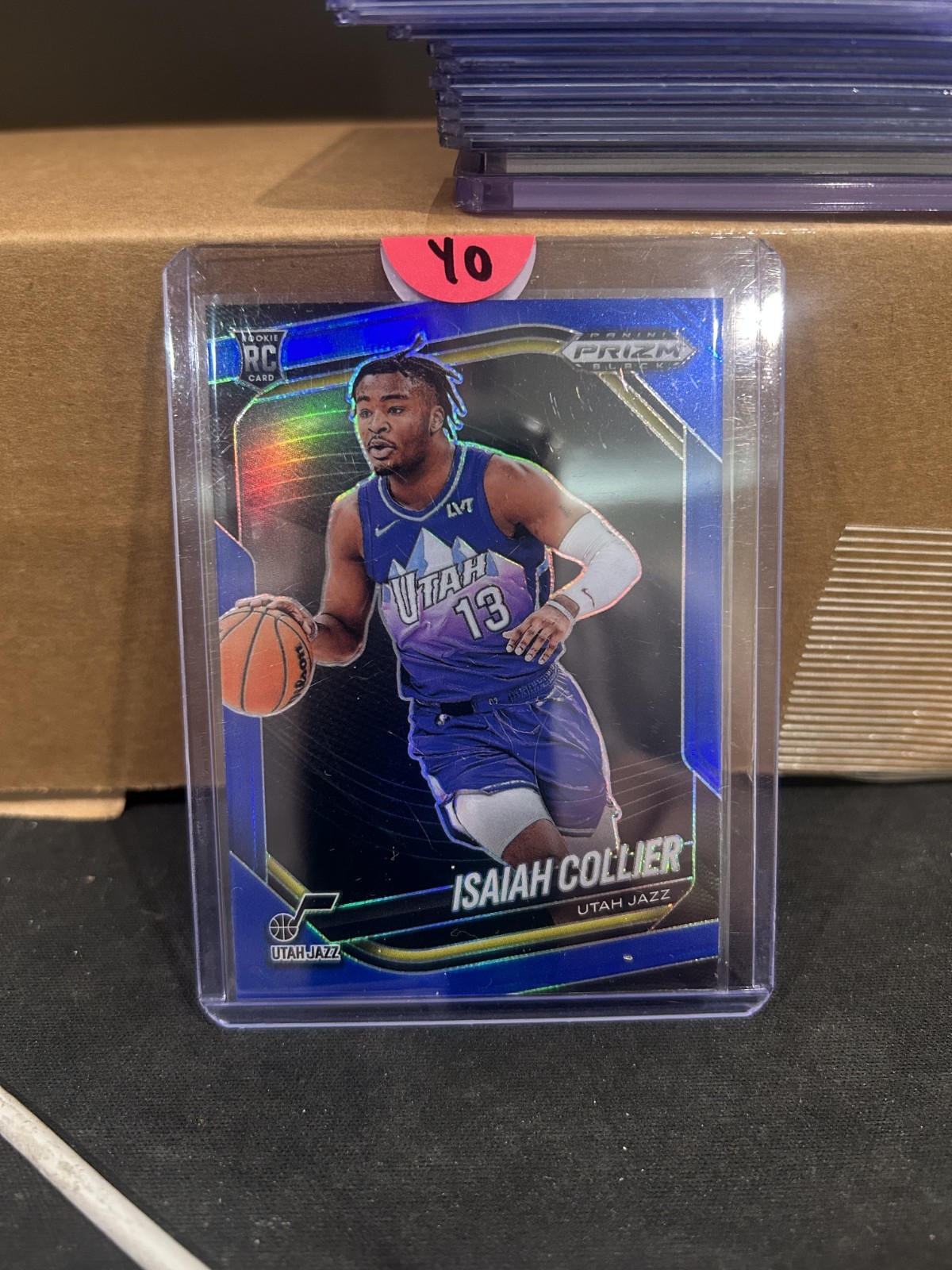 2024-25 Panini Prizm Black Isaiah Collier #32 Blue Prizm /199 (RC)
