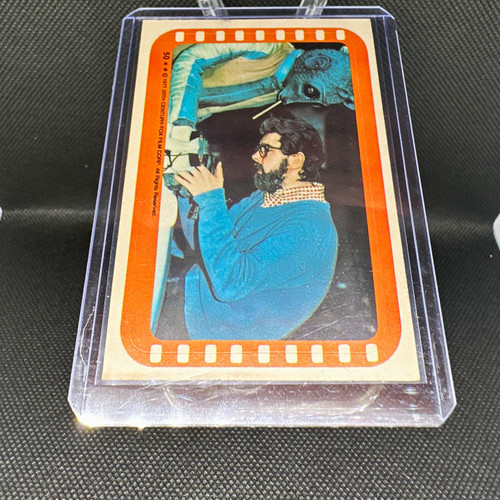 1977 Topps Star Wars Stickers #50 Director George Lucas and "Greedo" — TAG (grade unconfirmed)