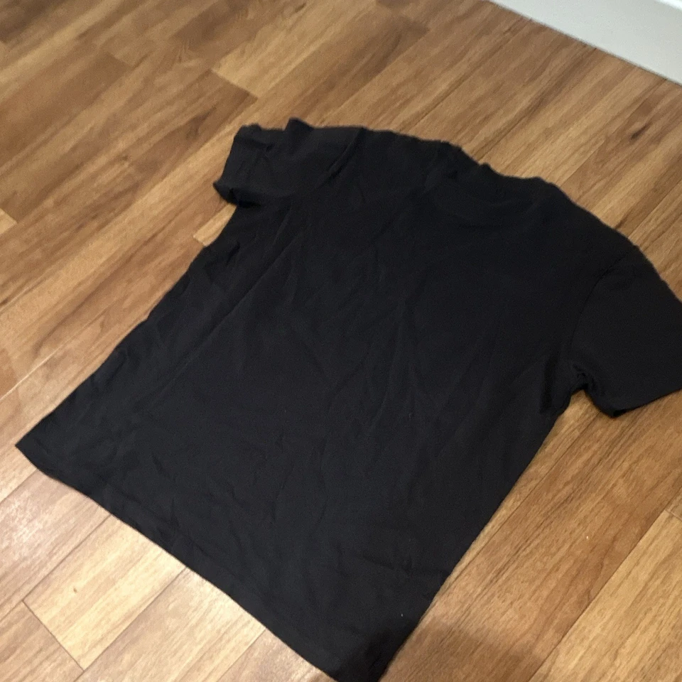 Camiseta de algodón manga corta cuello redondo con logotipo gráfico negro Champion para hombre talla M - Imagen 3 de 3