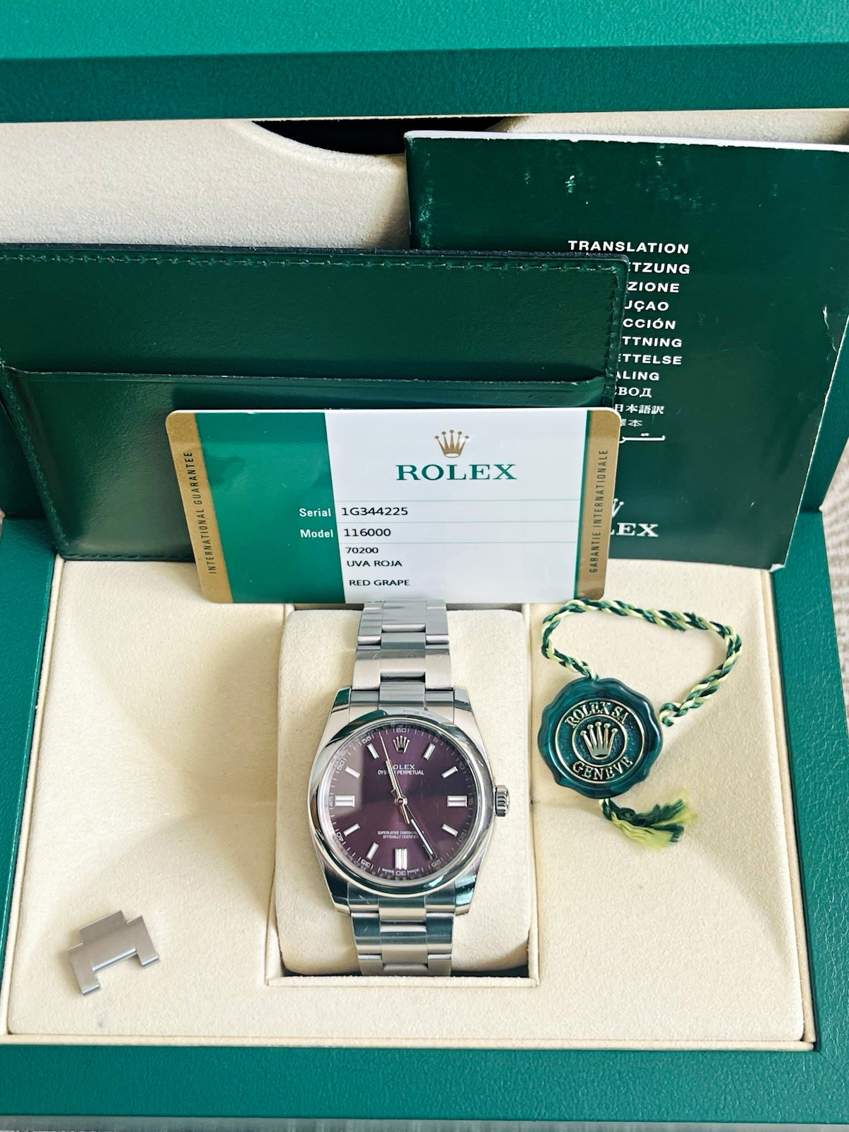 Rolex Oyster Perpetual 116000 36mm. 2015 : Red Grape Dial ,Box & Papers