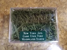 New York Jets Game Used Green Field Turf with Display Case and Green Nameplate