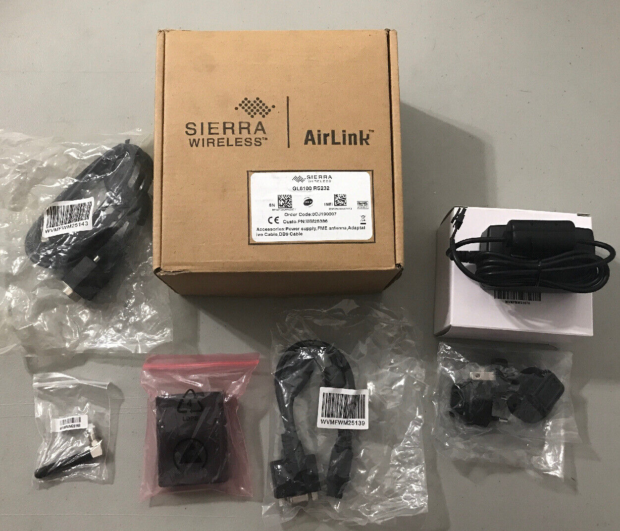 New In Box Sierra Wireless GL6100 RS232 Modem with Accessories
