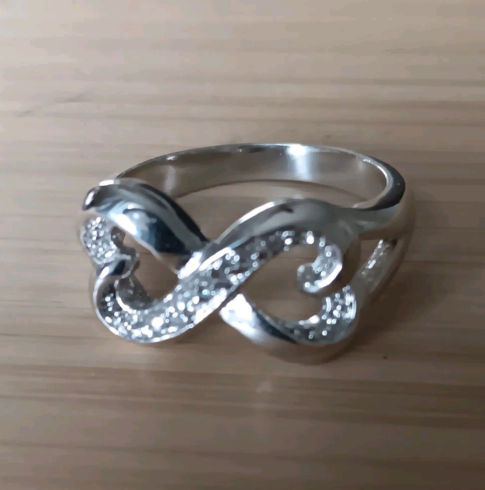 Intertwined Infinity Silver Tone Ring - image 1
