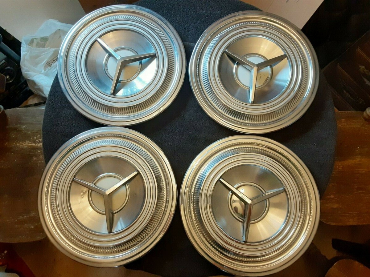 Set of 4 ) Vintage 1950's 59 Oldsmobile 3 Bar Flipper Style