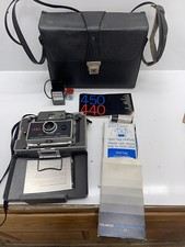 Vintage Polaroid 440 Automatic Land Camera, with original case Papers Etc.