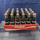 Vintage 24 Miniature 3" Coca Cola Glass Bottles in Red Plastic Crate.