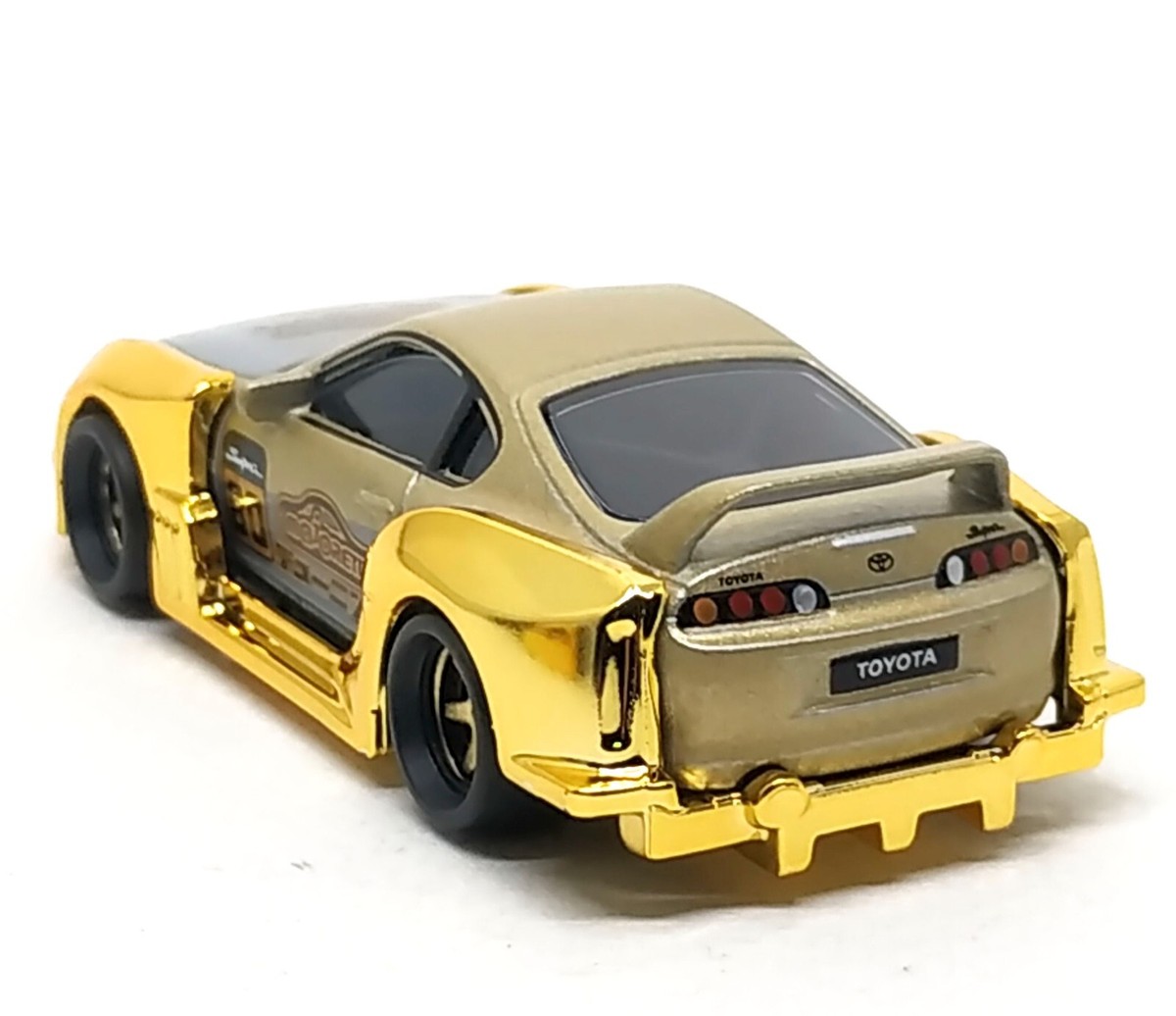 Majorette Toyota Supra JZA80 Gold with Frame - Japan Series Majorette Toyota Supra JZA80 Gold with Frame - Japan Series
