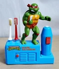 D-700 VINTAGE 1989 TEENAGE MUTANT NINJA TURTLES TALKING RAPHAEL TOOTHBRUST STAND