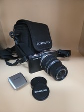 Near Mint Olympus Pen Mini E-PM1 Camera 14 - 42 mm Lens  Excellent With Charger