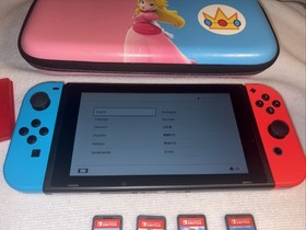 Nintendo Switch HAC-001 Neon Red/Blue JoyCons W/ Peach Case And 4 Games. EUC