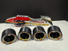 Sure Grip USA 96A Carrera Roller Skate Wheels Set Of 4 plus a skate part