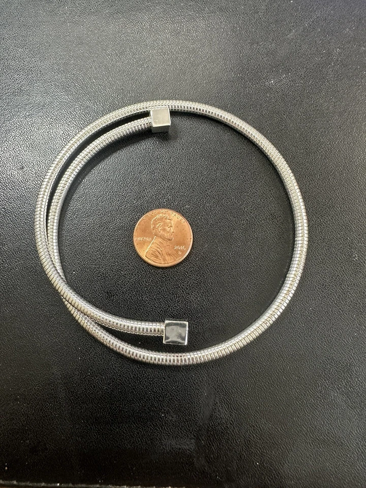 TOMMY HILFIGER STAINLESS STEEL COILED BANGLE WITH LOGO EXCELLENT - Image 2 of 3