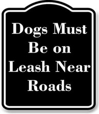Dogs Must Be on Leash Near Roads BLACK Aluminum Composite Sign
