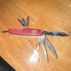 Victorinox Red Foldable Stainless Steel Multi-Tool Pocket Knife 2.5in Blade — photo 2