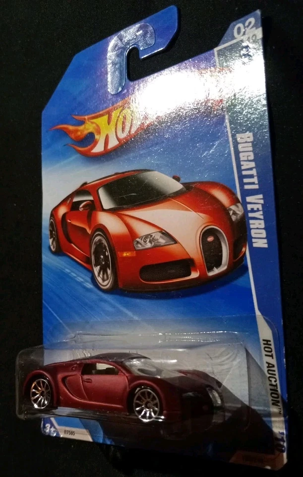 Bugatti Veyron 2010 Hot Wheels subasta exclusiva Walmart rojo con protector Foto 2 de 3