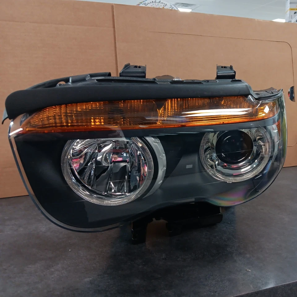 Faro izquierdo conductor bmw serie 7 2002 a 2005 xenón Hella BM2502148 Foto 2 de 4