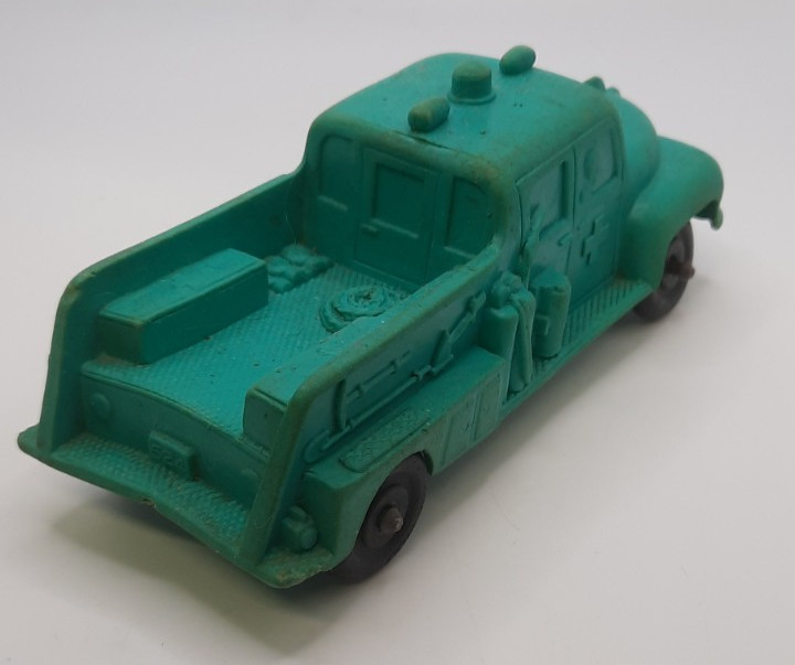 Auburn Rubber Fire Truck , Fireman Figure & Green Rescue Truck Vintage 1950's