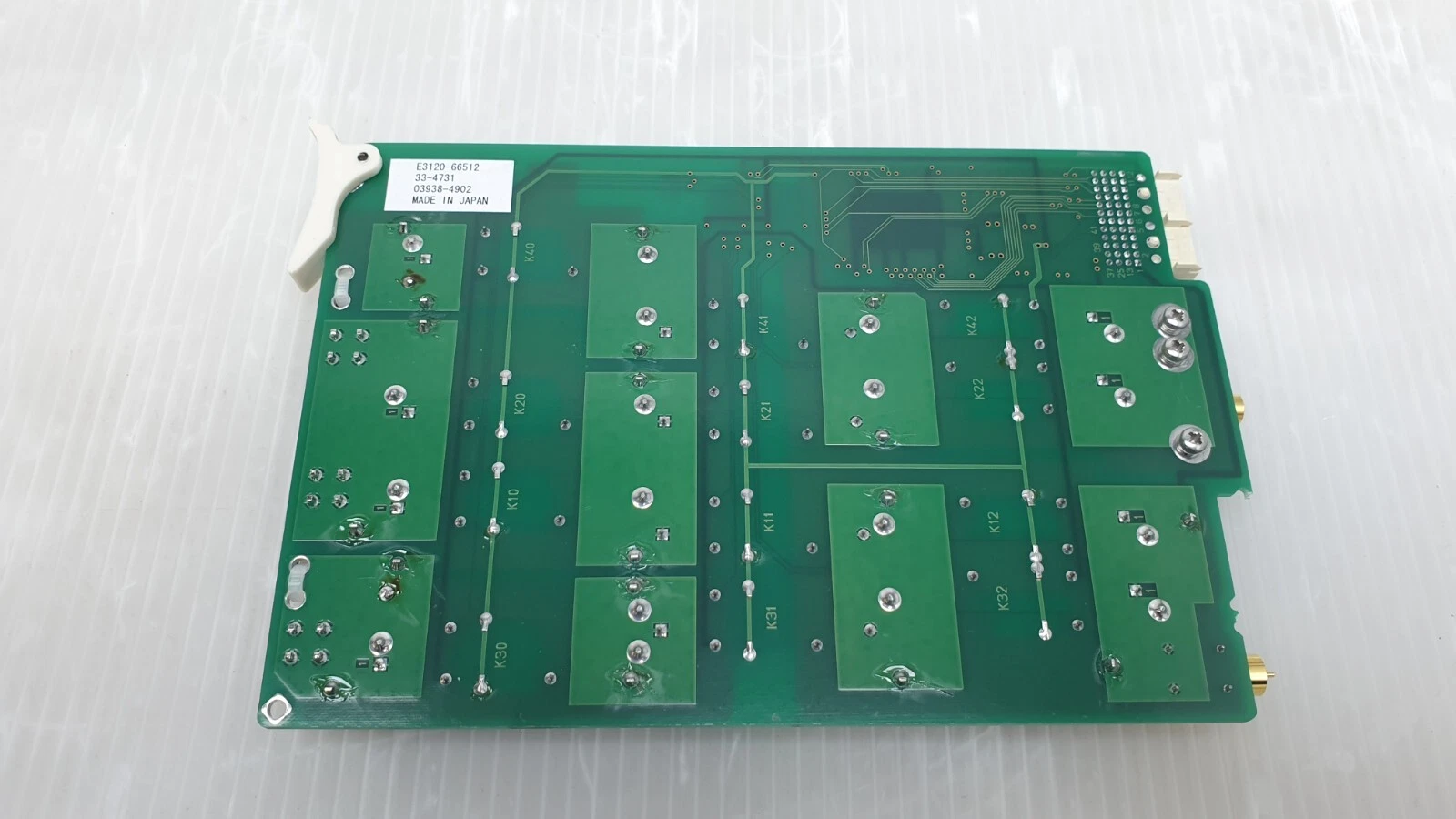 Solder side of the E3120-66512 board with relay designators K10 to K42