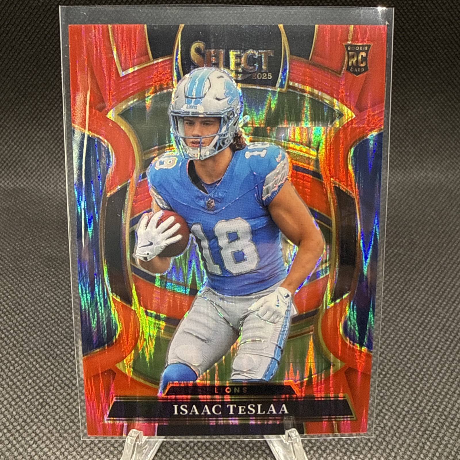 2025 Panini Select Concourse Isaac TesLaa Red Prizm Shock /249