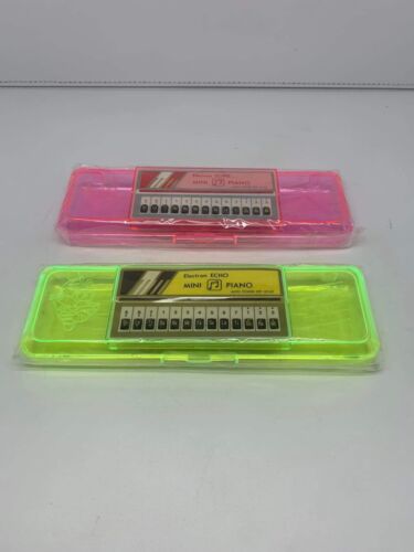 Vintage 2x Electron ECHO Mini-Piano Transparent Yellow - Pink '80s BRAND NEW - Picture 1 of 5