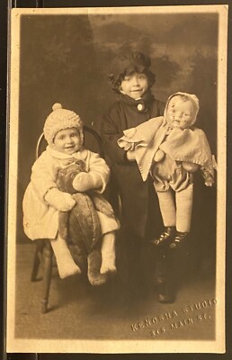 Studio Real Photo RPPC~2 Little Sisters Hold Teddy Bear & Large Doll~Kenosha WI