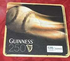 GUINNESS STOUT Gaelic Athletic Association Hurling  BEER COASTER - IRELAND 2009