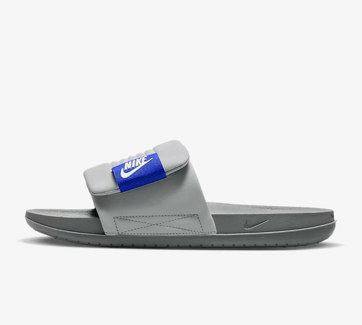 Blue and best sale grey nike slides
