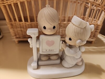 VINTAGE RETIRED PRECIOUS MOMENTS ''MY HEART IS EXPOSED WITH LOVE'' NURSE X-RAY