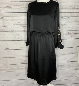 black dress with gold flowers