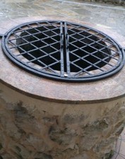 grille de puits en fer forgé