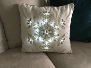 white snowflake pillow
