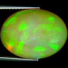 9.87 Ct IGI Certified Natural Ethiopian Opal Gemstone Oval Cabochon Cut — photo 1