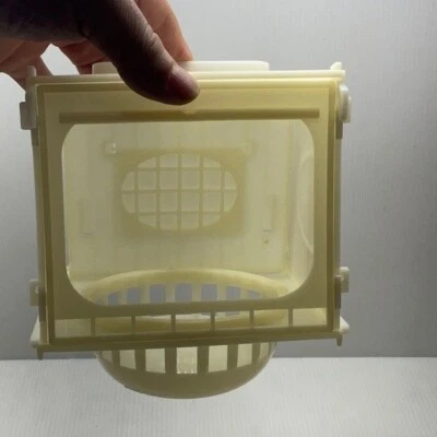 Canary’s bird nest hangs on outside of the door cage