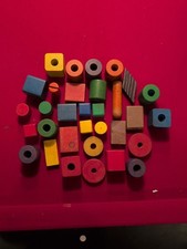 Lot Of 55 vintage Playskool colored wooden building blocks. As Is