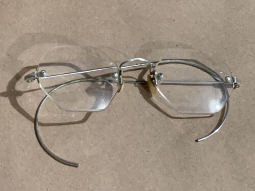 Gold vintage rimless eyeglass   Gem