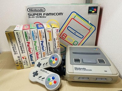 Super Nintendo Entertainment System and 7 game software sets