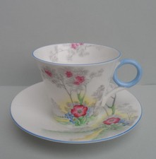 A Shelley for Lawleys Art Deco 0148 Regent shape demitasse cup & saucer C.1940.