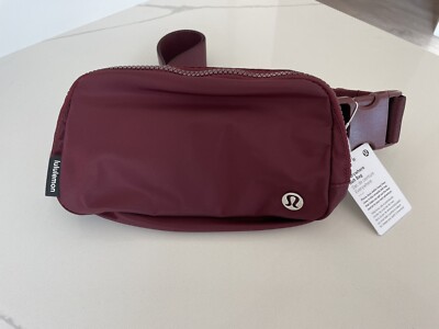 lululemon maroon bag Everywhere Belt 1L Red Merlot Decorated with a 2026 PGA Championship logo heat seal on the bottom left corner Lululemon Wineberry Purse | TikTok