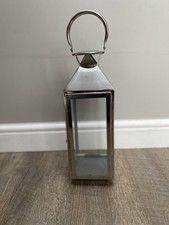 NEXT metal lantern in stainless steel finish with glass panels.Approx 45cm tall.