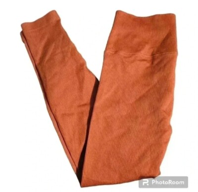 Victoria Sport Orange Leggings Size Medium Small Thread Pull
