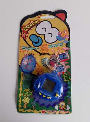 DINKIE DINO TAMAGOTCHI STIL ELEKTRONISCHES HAUSTIER. UNVOLLSTÄNDIG SIEHE BESCHREIBUNG.