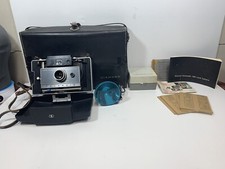Vintage Polaroid Automatic 100 Land Camera Untested with Cover And Manual Extras