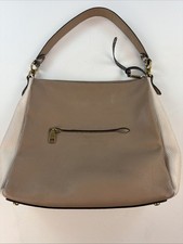 Coach shoulder bag in two tones of taupe and beige with a snakeskin handle.