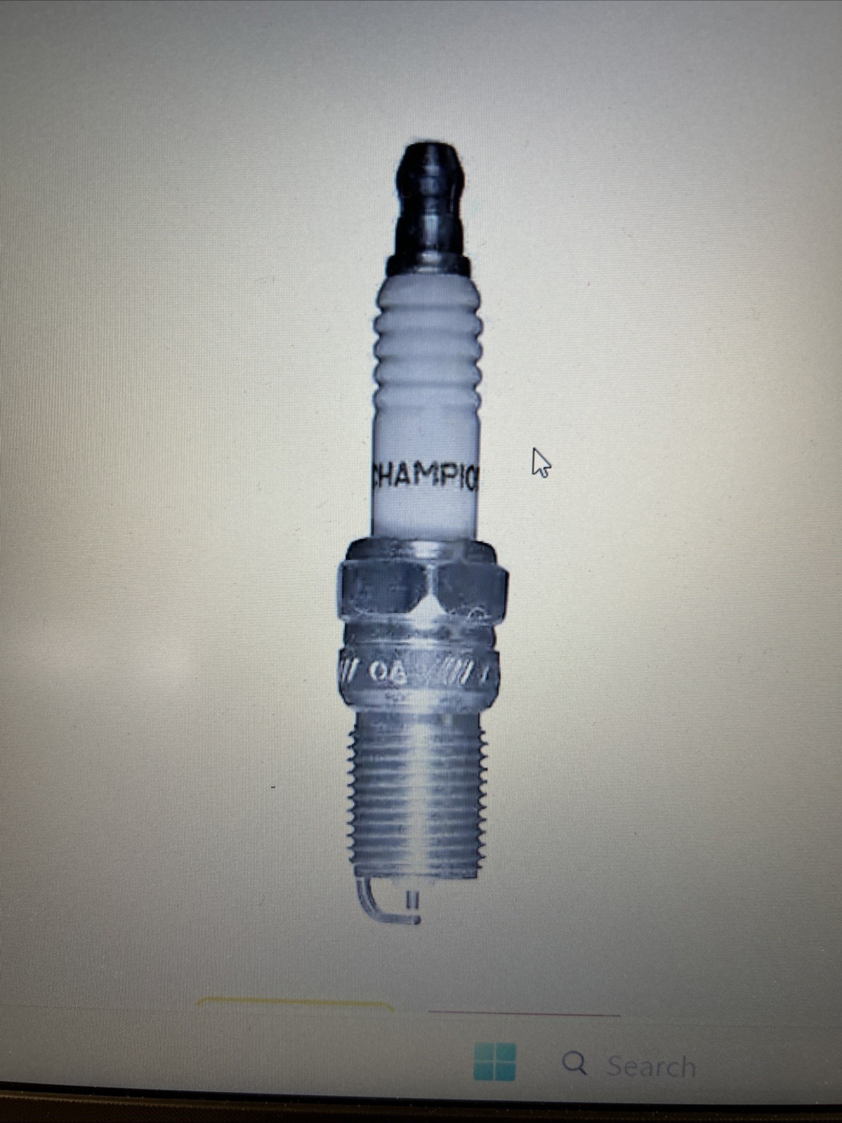 Champion Copper Plus Spark Plug, model 909 RS17YX.