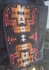 messenger bag featuring a distinctive Southwe...
