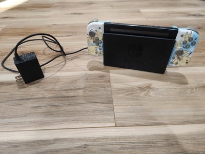 Nintendo Switch HAC-001 bundle with controllers, dock, and AC adapter