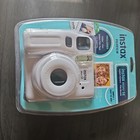 New Fujifilm Instax mini SE Instant camera .  New never opened. Gray