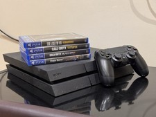 Sony PlayStation 4 500GB Black Gaming Console with Controller Bundle 4 Games